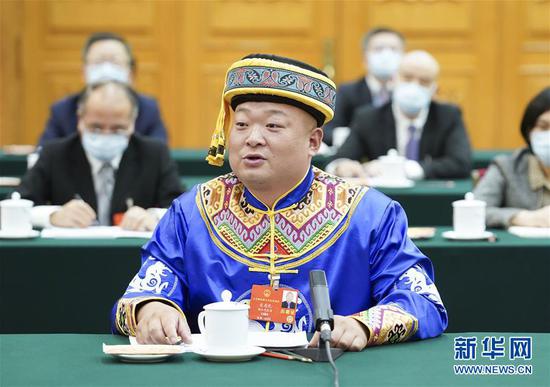  5月24日，全國人大代表宋慶禮參加湖北代表團(tuán)的審議并發(fā)言。新華社記者 黃敬文 攝